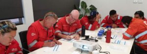 Dogging and rigging courses Brisbane - class around a table