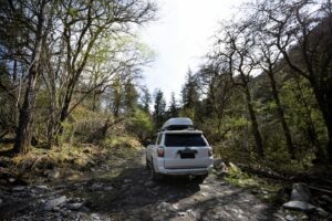 4WD Training - driving offroad car on trail in high altitude